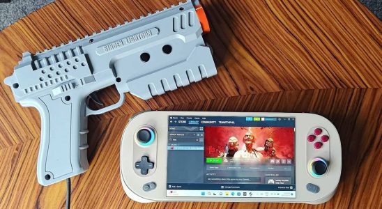 Sinden Lightgun next to Ayaneo 2S handheld