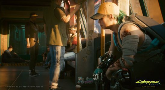 A woman sits on a Metro train in a still from Cyberpunk 2077.