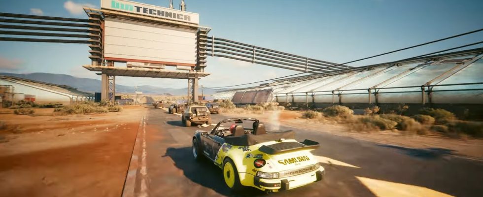 Cyberpunk 2077: cars racing each other along an industrial-looking road.