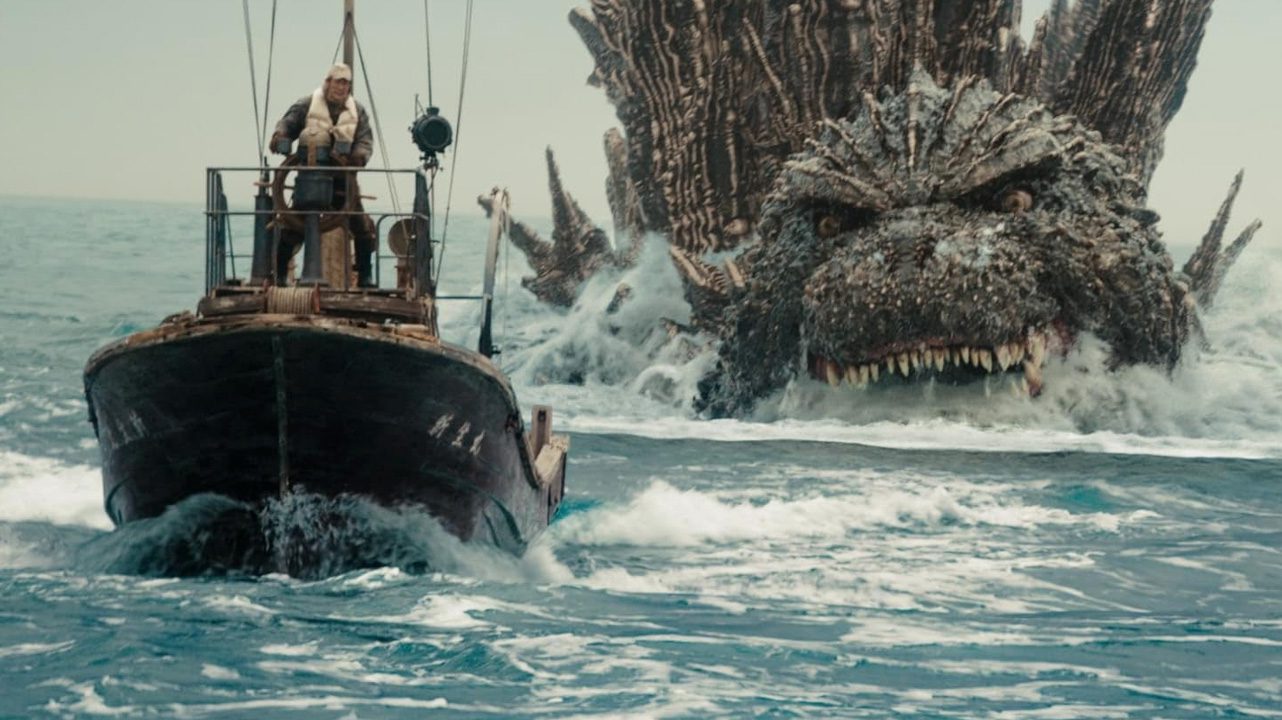 A boat being chased by Godzilla, a giant lizard monster.