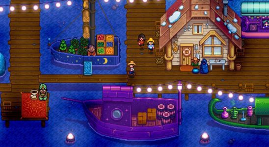 Stardew Valley: the night market on the docks brightly lit.