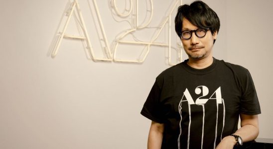 Hideo Kojima standing in front of an A24 logo