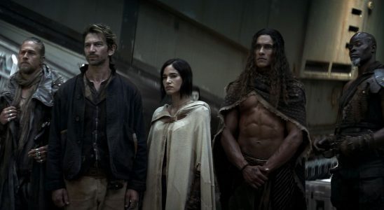 Charlie Hunnam as Kai, Michiel Huisman as Gunnar, Sofia Boutella as Kora, Staz Nair as Tarak and Djimon Hounsou as Titus in Rebel Moon