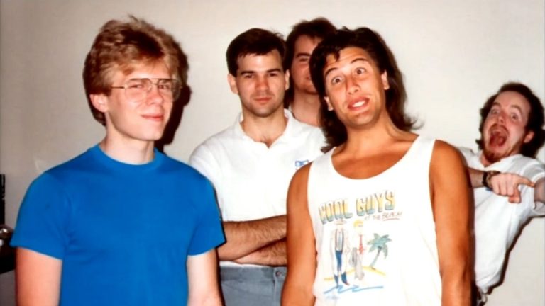 An old photo of id Software showing a young John Carmack and John Romero.