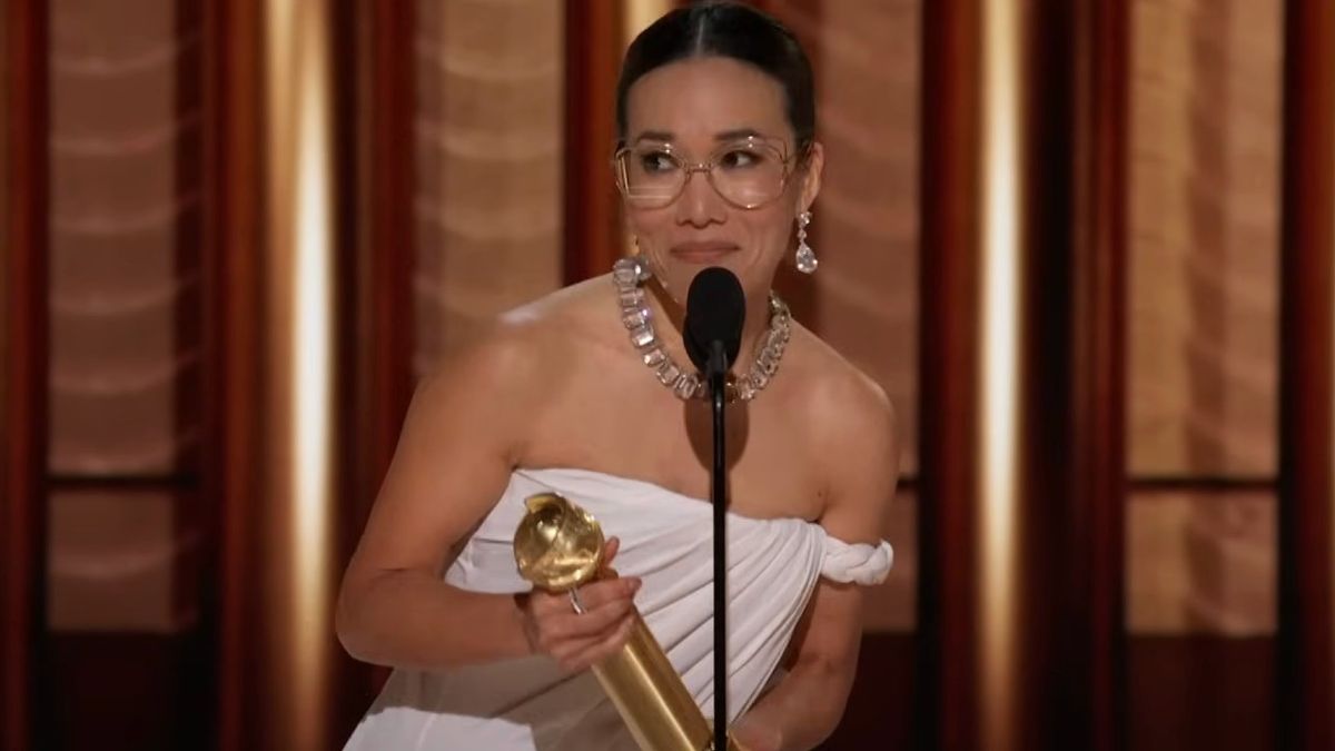 Ali Wong on stage accepting her Golden Globe award