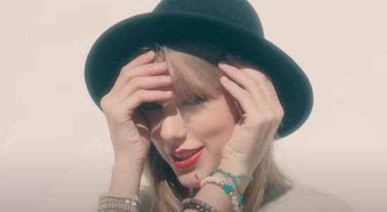 Taylor Swift wearing the 22 hat in the 22 music video.