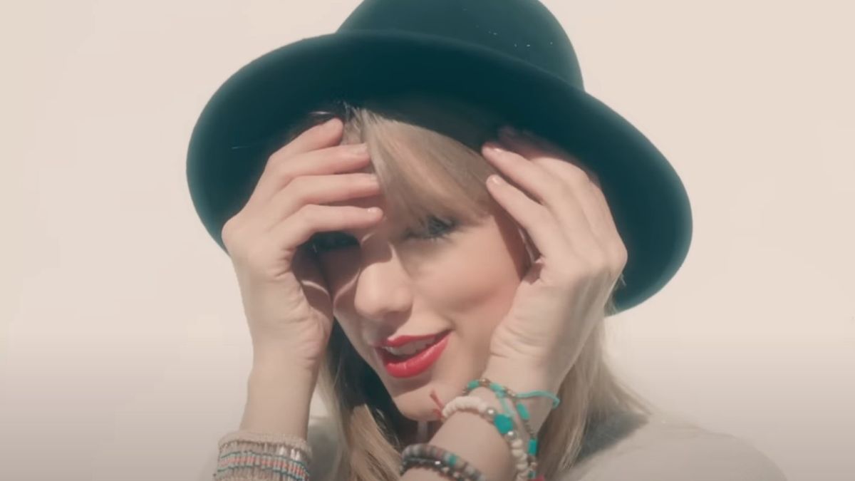 Taylor Swift wearing the 22 hat in the 22 music video.