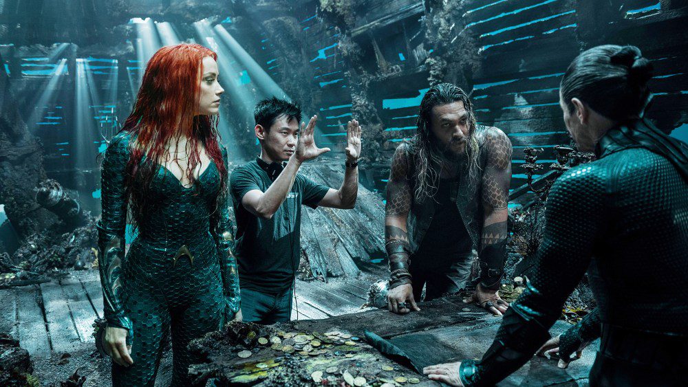 AQUAMAN, from left: director James Wan, Amber Heard, Jason Momoa, Willem Dafoe, on set, 2018. ph: Jasin Boland/ © Warner Bros./courtesy Everett Collection