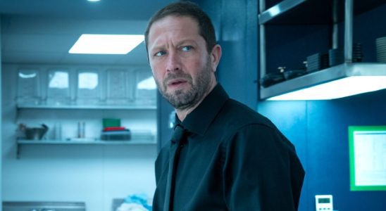 Ebon Moss-Bachrach as Richie standing in a kitchen in Season 2 of The Bear.