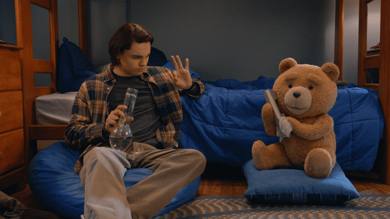 Max Burkholder as John, Seth MacFarlane as voice of Ted in Episode 2 