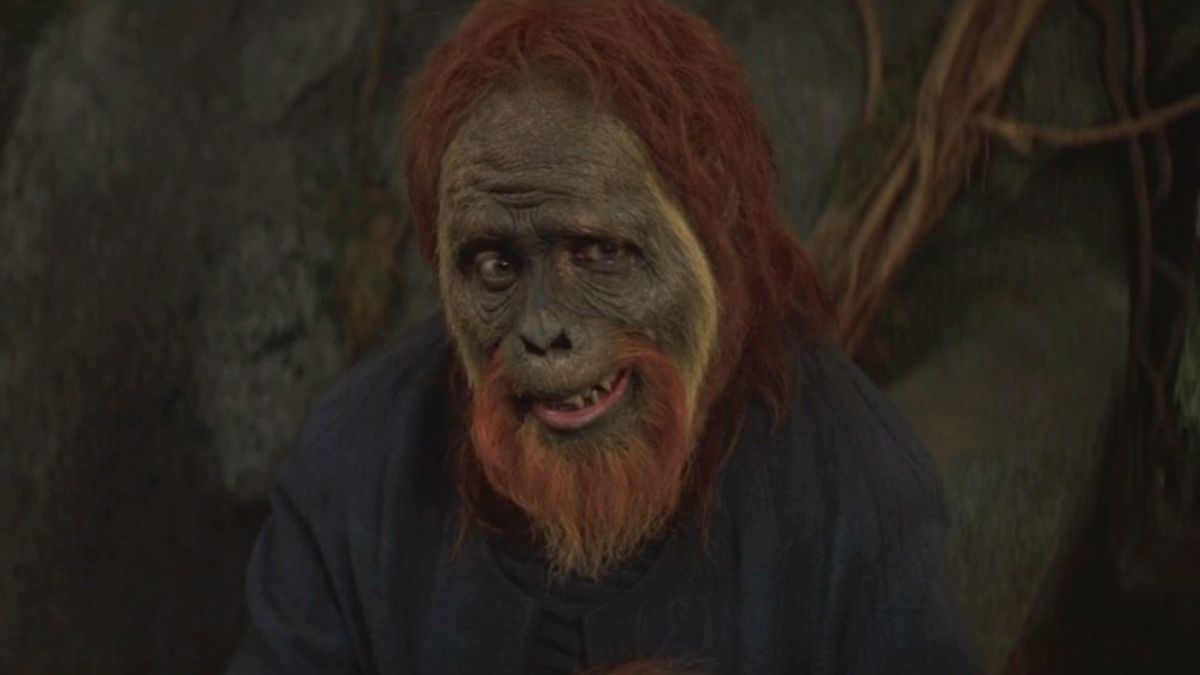 Paul Giamatti looks uncertain while dressed as an ape in Planet of the Apes.