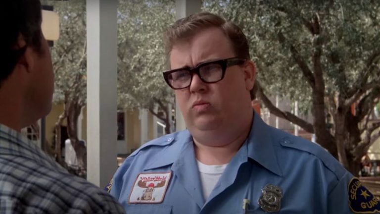 John Candy makes a face of questioning in National Lampoon