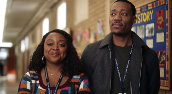 Janine and Gregory standing next to each other in Abbott Elementary