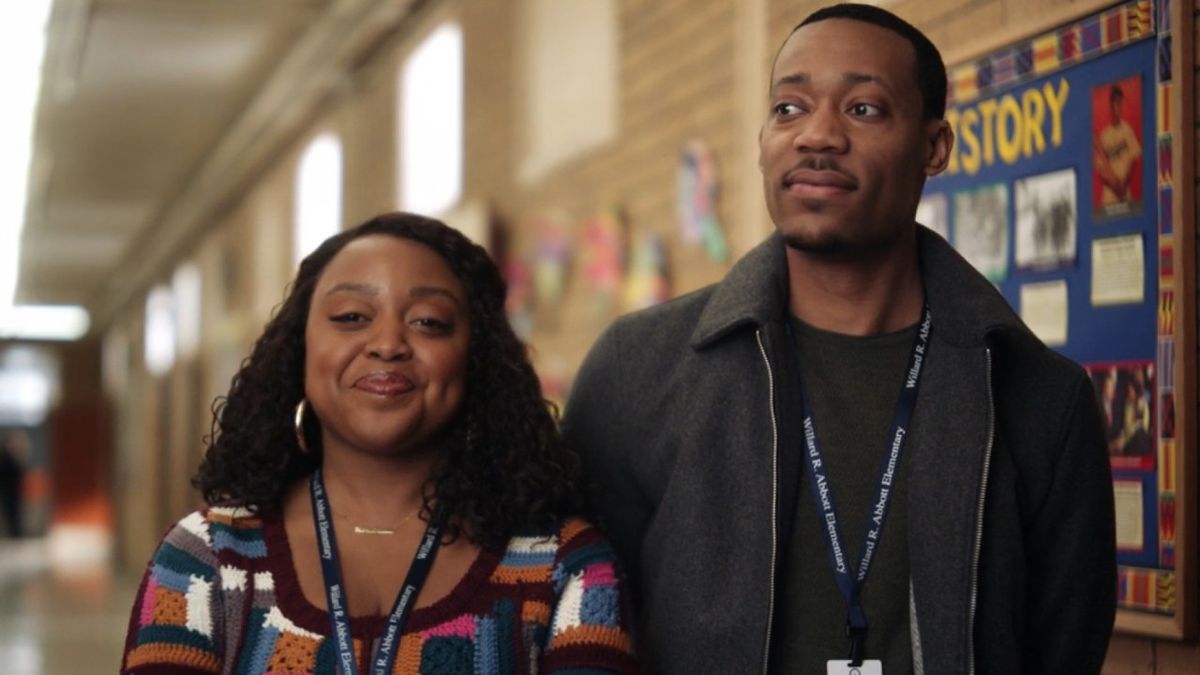 Janine and Gregory standing next to each other in Abbott Elementary