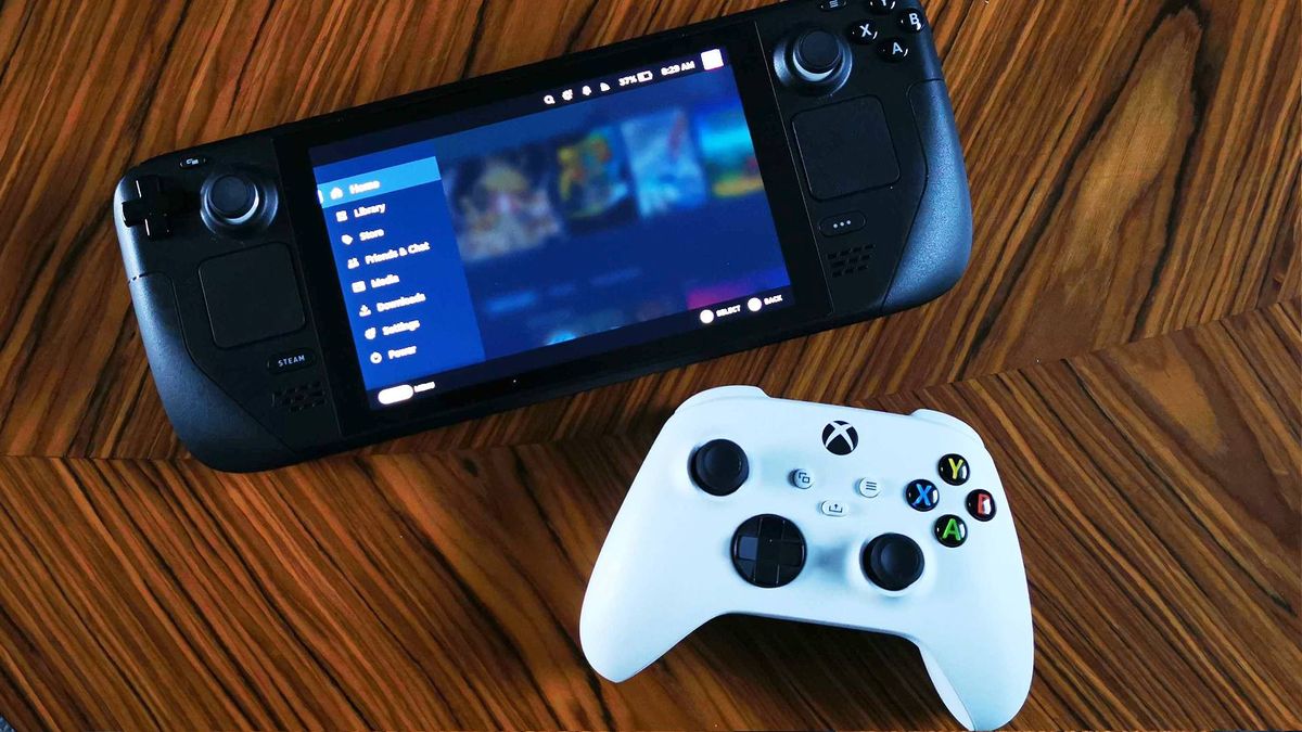 Xbox Wireless Controller next to Steam Deck on woodgrain table