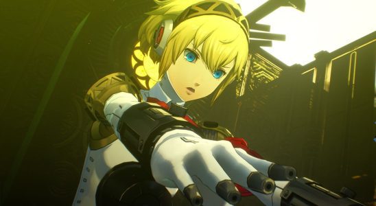 Aigis from Persona 3 Reload readies her weapon.