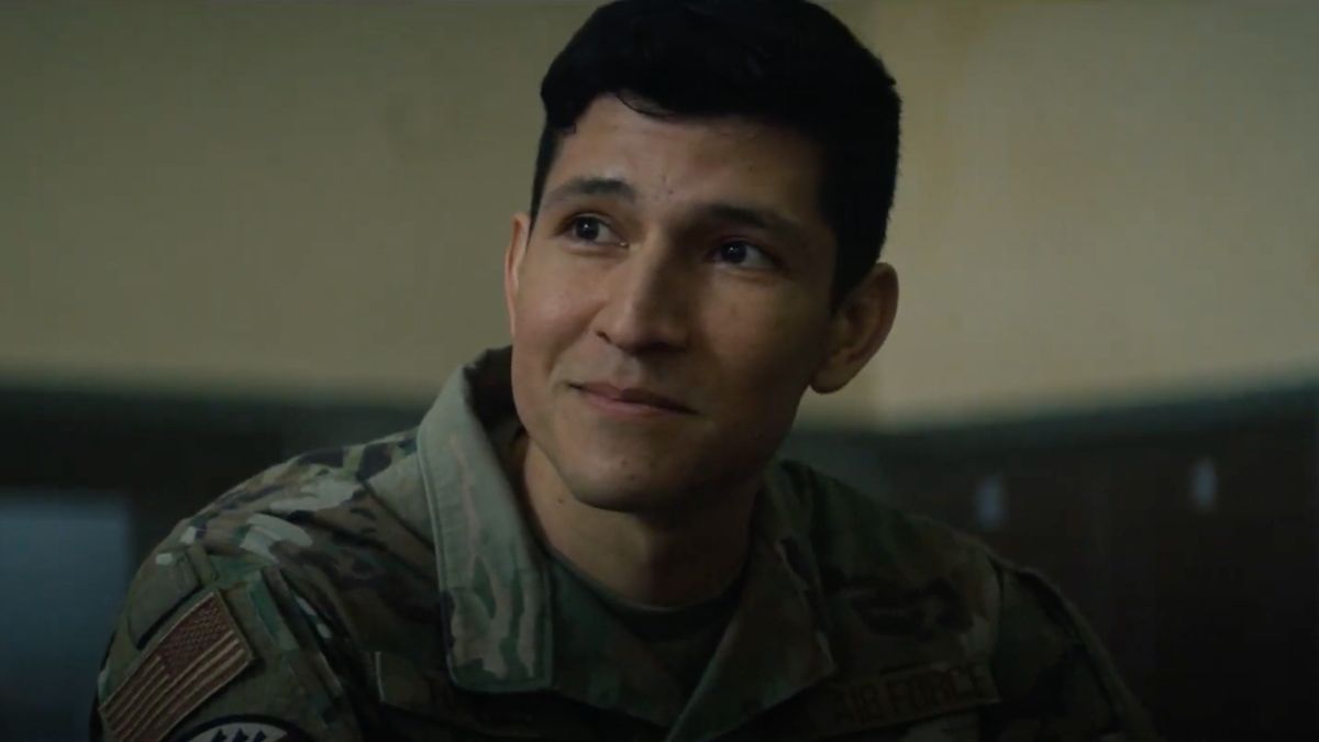 Danny Ramirez smiling in uniform in The Falcon and the Winter Soldier.