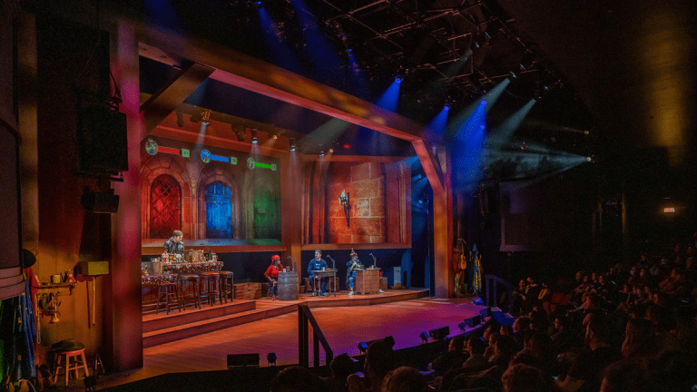 A promotional image of the Dungeons & Dragons: The Twenty-Sided Tavern live play and stage show.