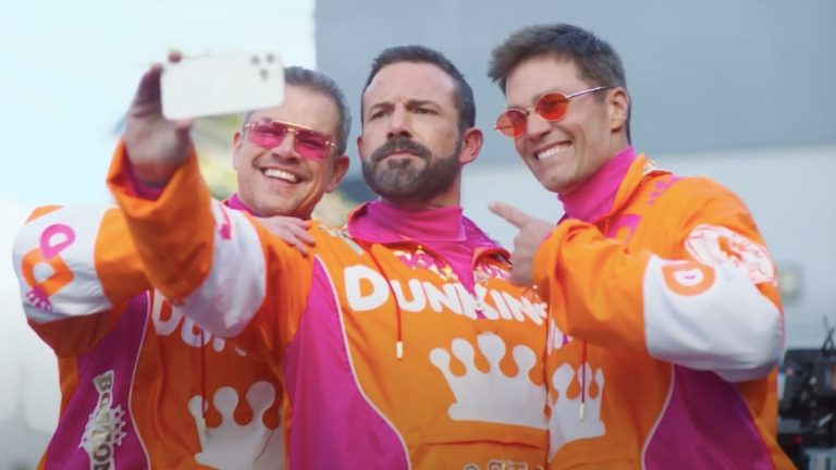 Matt Damon, Ben Affleck, and Tom Brady taking a selfie in Dunkin