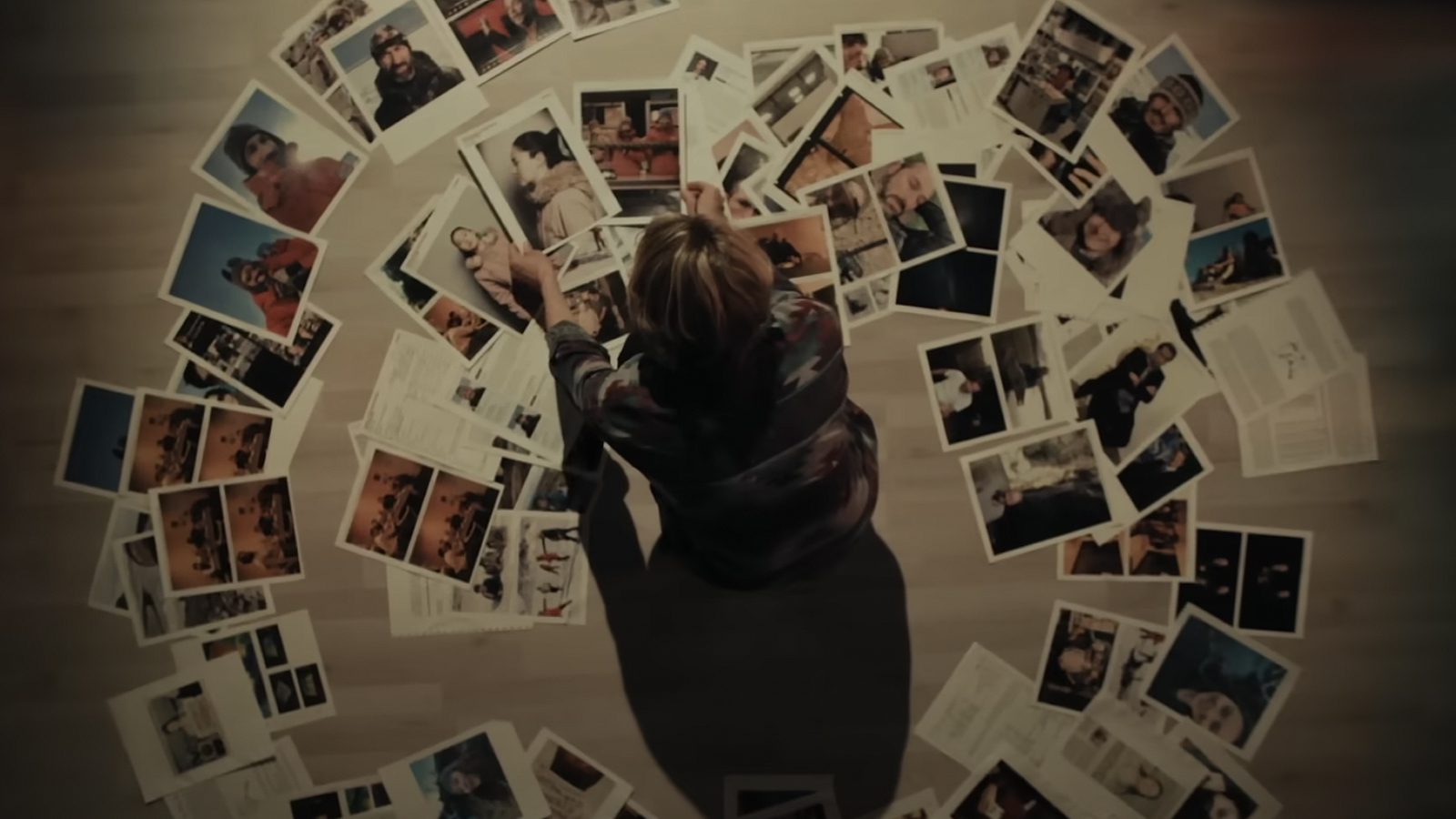 Liz Danvers with a spiral of photos in True Detective: Night Country