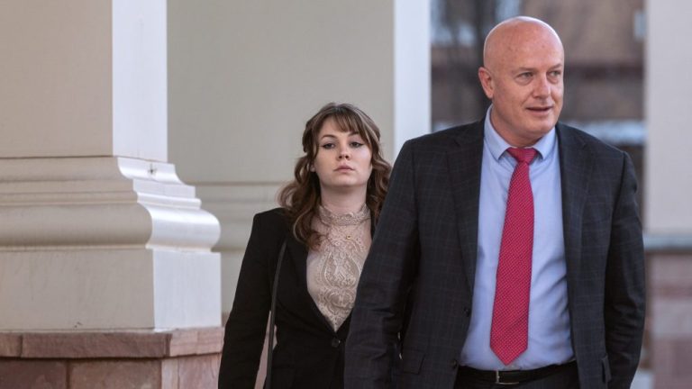 Hannah Gutierrez-Reed, left, with her attorneys Jason Bowles, leaves First District Court, Wednesday, February 21, 2024. The trial for Gutierrez-Reed, who was working as the armorer on the movie "Rust" when a revolver actor Alec Baldwin was holding fired killing cinematographer Halyna Hutchins and wounded the film’s director Joel Souza, begins Thursday morning in Santa Fe, N.M.