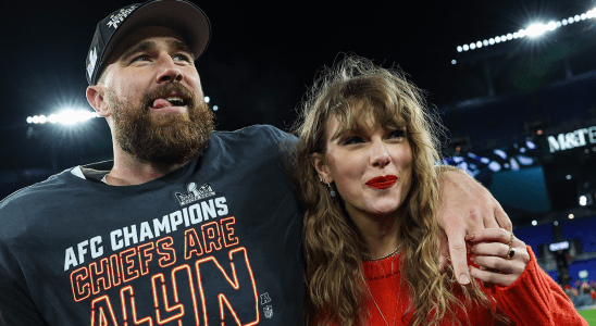 Travis Kelce #87 of the Kansas City Chiefs (L) celebrates with Taylor Swift after defeating the Baltimore Ravens in the AFC Championship Game at M&T Bank Stadium on January 28, 2024