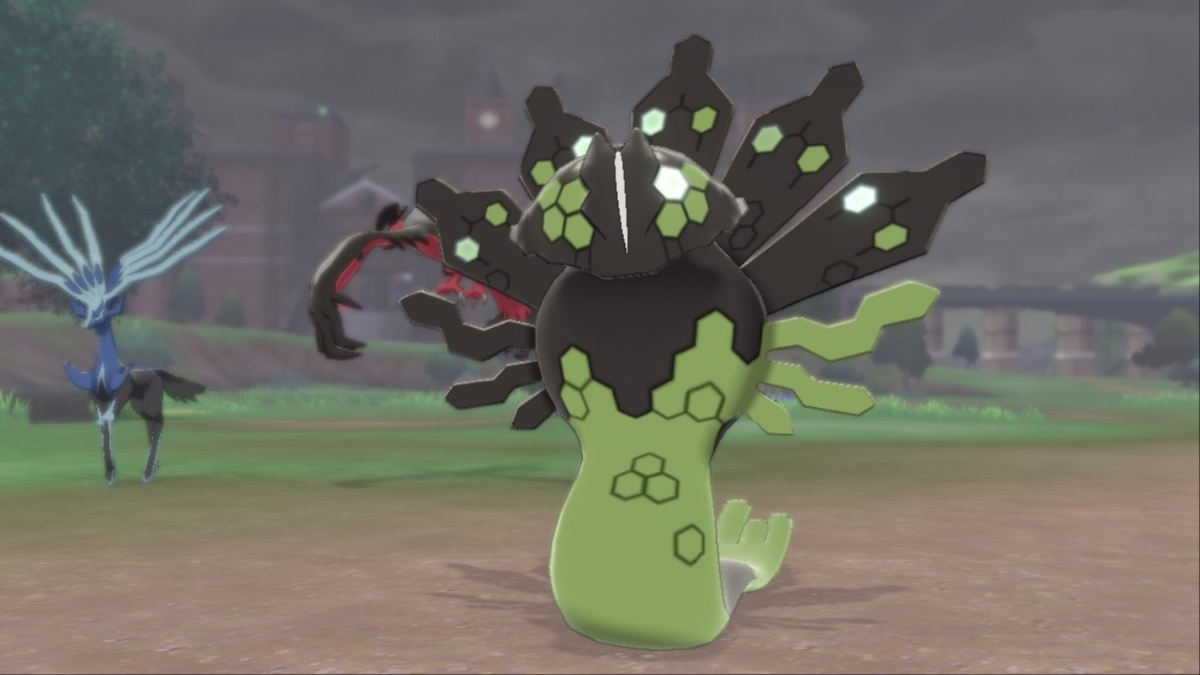 Capture d'écran de Pokémon Épée et Bouclier de Zygarde, Xerneas et Yveltal au camp.