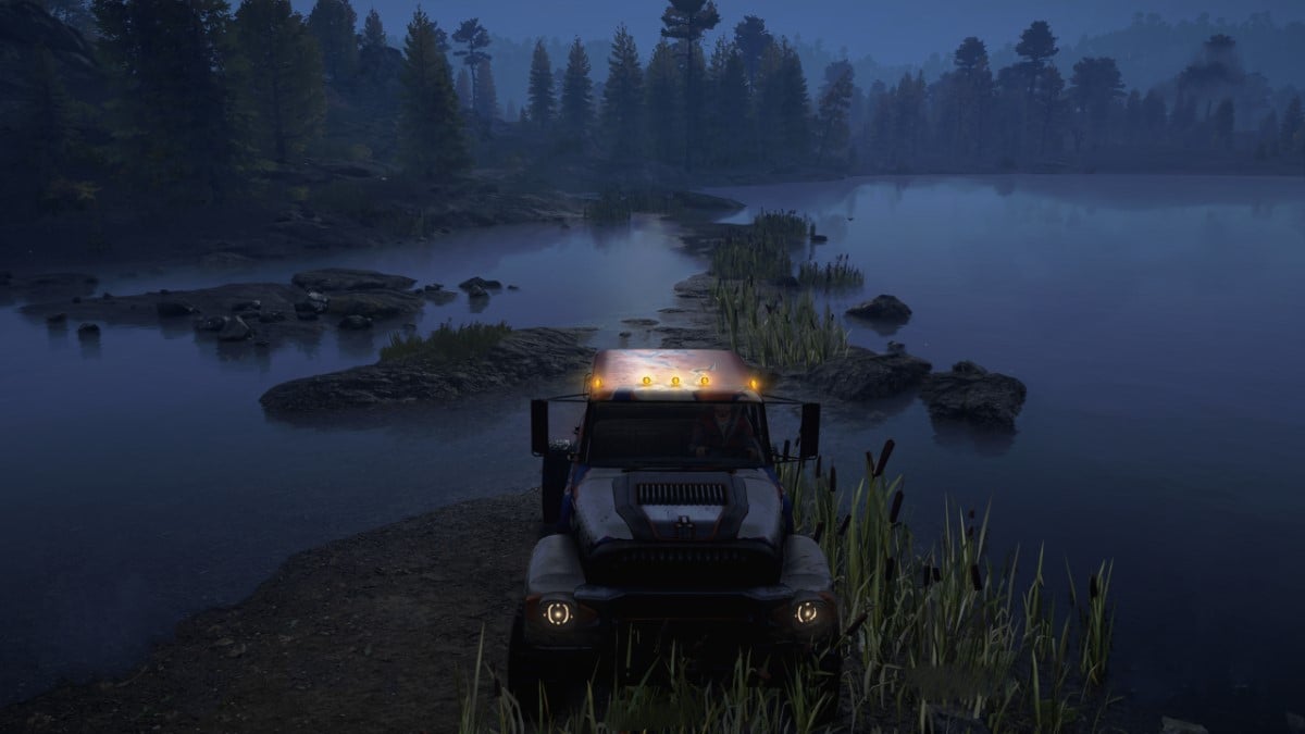 Un camion traverse une tourbière la nuit