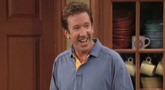 Tim Taylor smiling inside house in Home Improvement