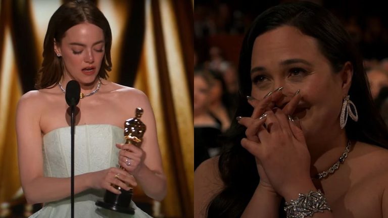 Emma Stone accepting Oscar while Lily Gladstone watches