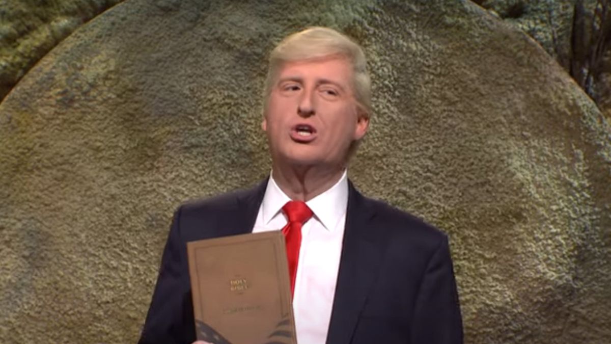 James Austin Johnson as Donald Trump selling Bibles in a suit on SNL.