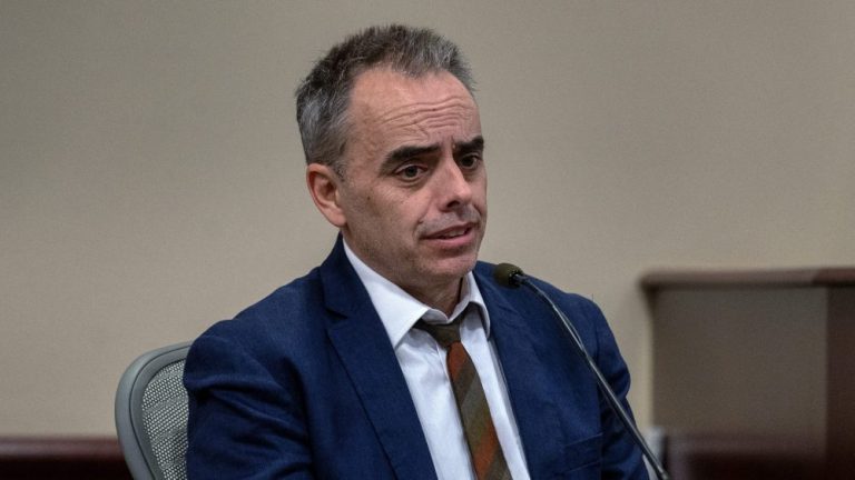 Director Joel Souza testifies in the trial against Hannah Gutierrez-Reed, in First District Court, in Santa Fe, N.M., Thursday, February 22, 2024. Gutierrez-Reed, who was working as the armorer on the movie "Rust" when a revolver actor Alec Baldwin was holding fired killing cinematographer Halyna Hutchins and Souza, is charged with involuntary manslaughter and tampering with evidence.