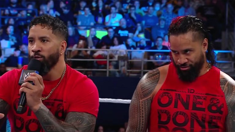 The Usos talking smack in a WWE ring.