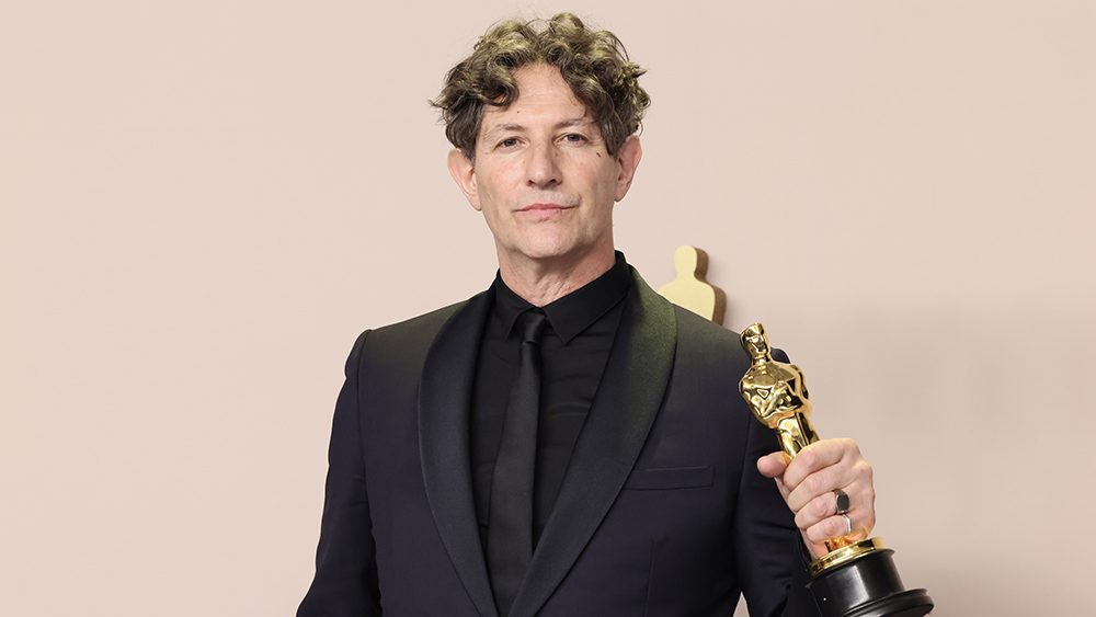 HOLLYWOOD, CALIFORNIA - MARCH 10: Jonathan Glazer, winner of the Best International Feature Film award for 'The Zone of Interest,' poses in the press room during the 96th Annual Academy Awards at Ovation Hollywood on March 10, 2024 in Hollywood, California. (Photo by Rodin Eckenroth/Getty Images)