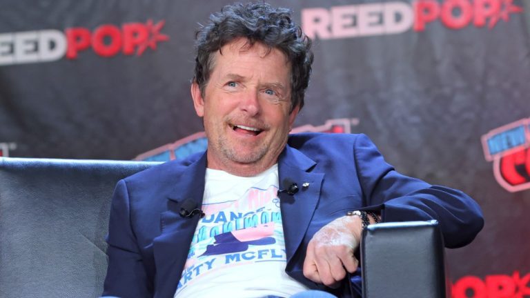 NEW YORK, NEW YORK - OCTOBER 08: Actors Michael J. Fox speaks during a "Back To The Future Reunion" panel at New York Comic Con on October 08, 2022 in New York City. (Photo by Mike Coppola/Getty Images)