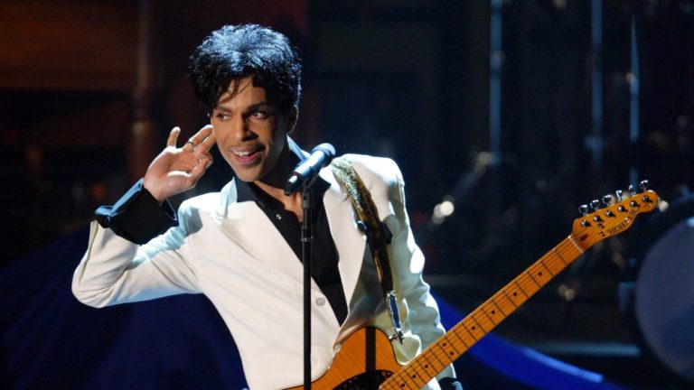 (EXCLUSIVE, Premium Rates Apply) Prince performs after being inducted into the Rock and Roll Hall of Fame  (Photo by Kevin Kane/WireImage)