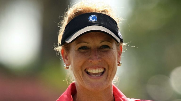 Stephanie Sparks, of The Golf Channel, smiles after making a birdie on the second hole during the first round of the Ginn Open at Reunion Resort April 17, 2008 in Reunion, Florida.