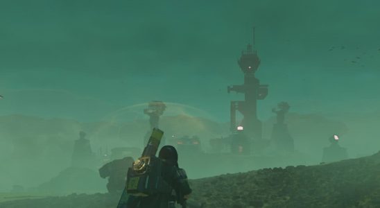 Helldivers 2 image of a player looking at a compound in distance