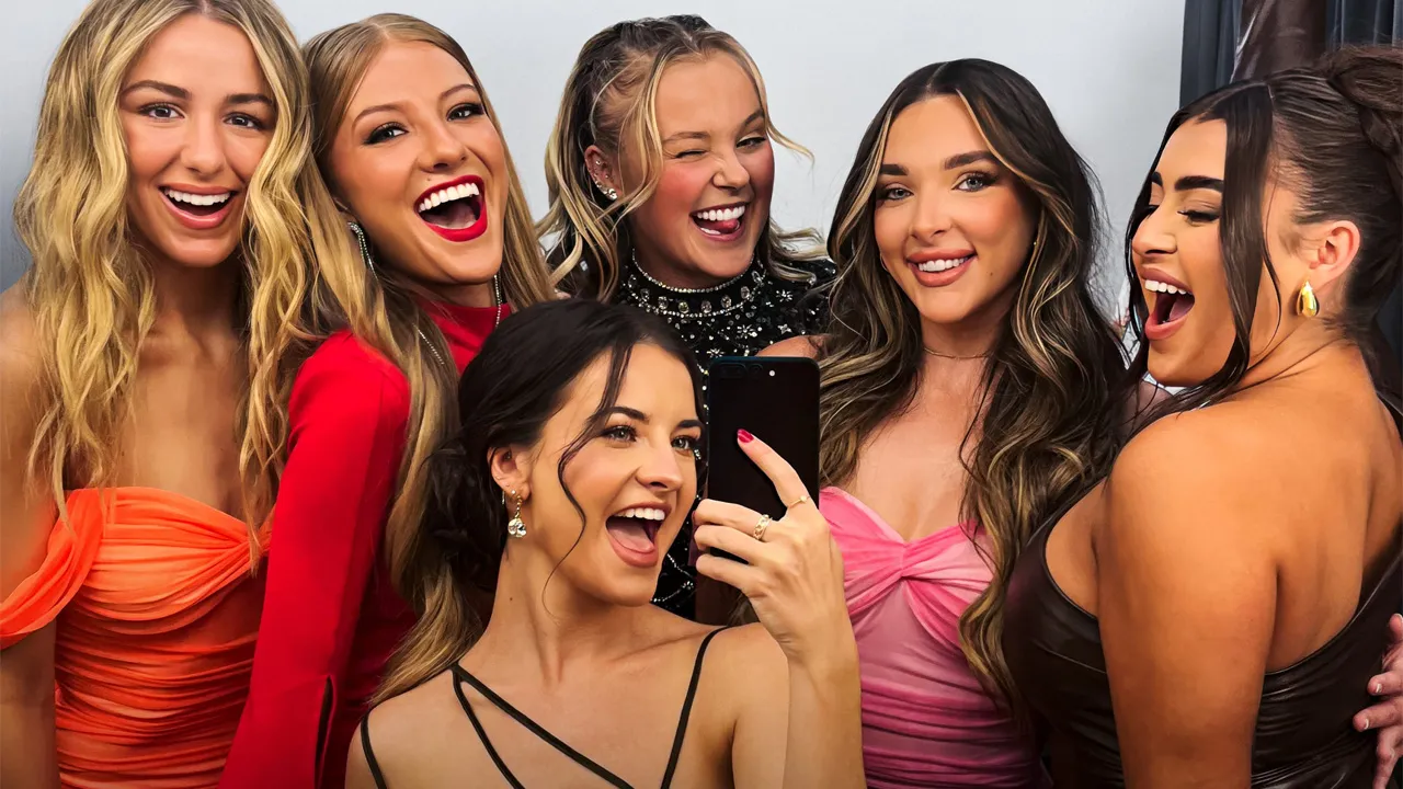 Dance Moms' reunion, with several of the girls from the show smiling at the camera.