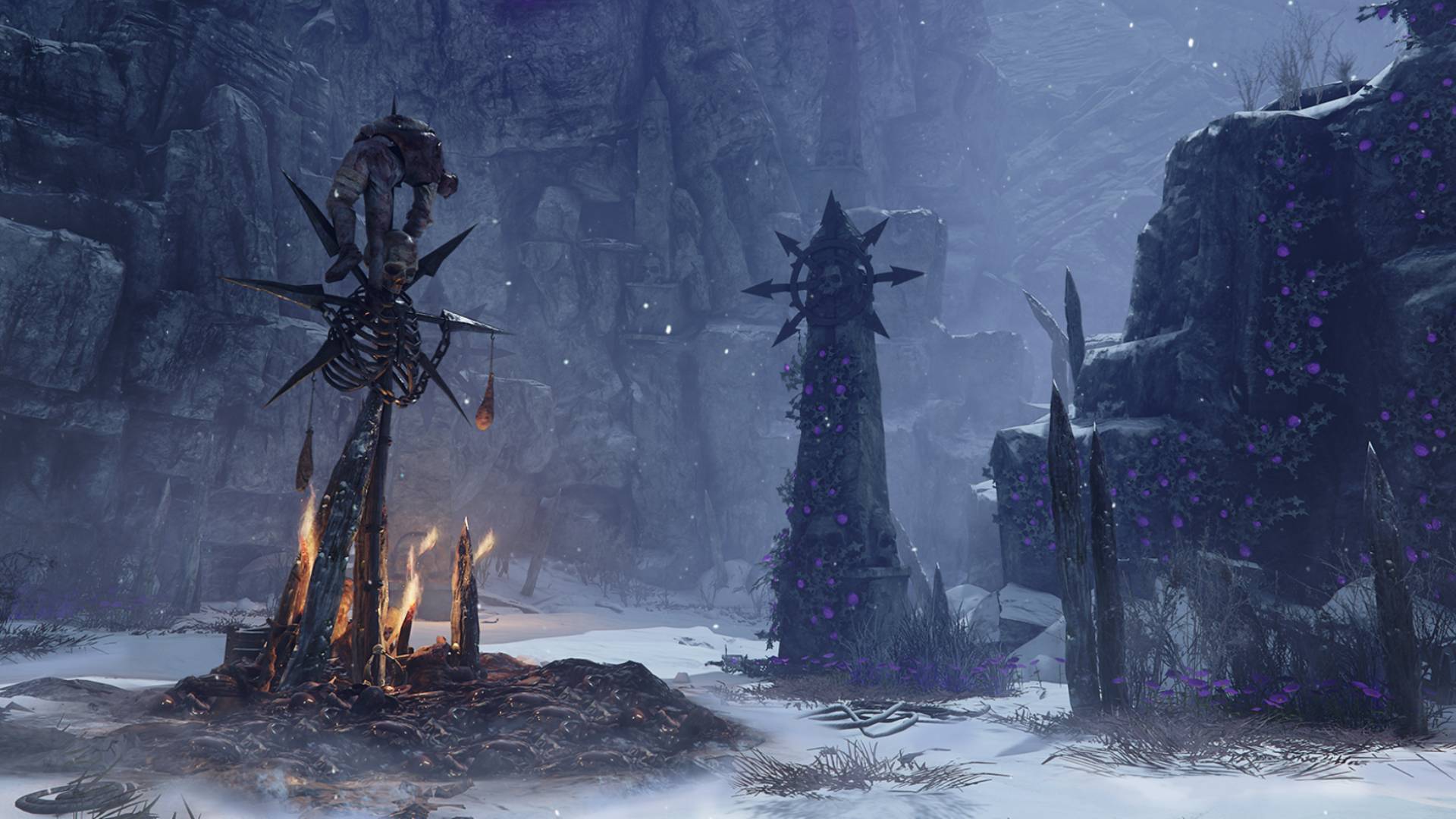 La nouvelle mise à jour de Vermintide 2 ramène Versus, mais pas pour longtemps : plusieurs piliers chaotiques sont éparpillés autour d'une montagne enneigée, avec un corps empalé sur l'un d'entre eux.