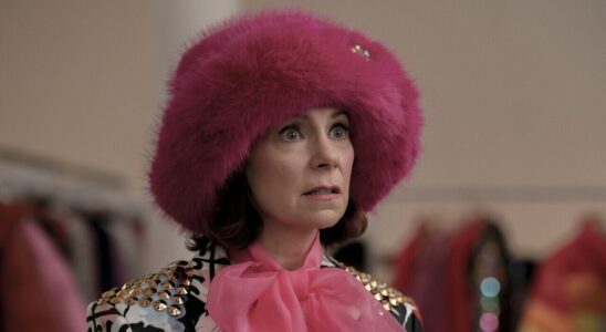 Carrie Preston wearing a pink fuzzy hat as Elsbeth in Season 1 finale