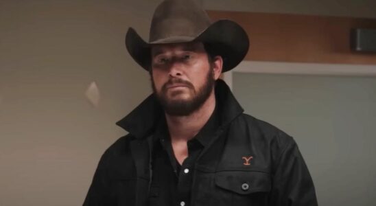 Cole Hauser as Rip standing inside and wearing a cowboy hat in Yellowstone.