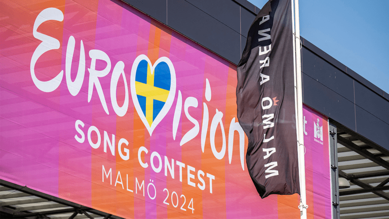 A picture taken on April 25, 2024 shows A Eurovision banner hangs outside Malmo Arena, the venue where the Eurovision song contest (ESC) will take place in Malmo, Sweden. 