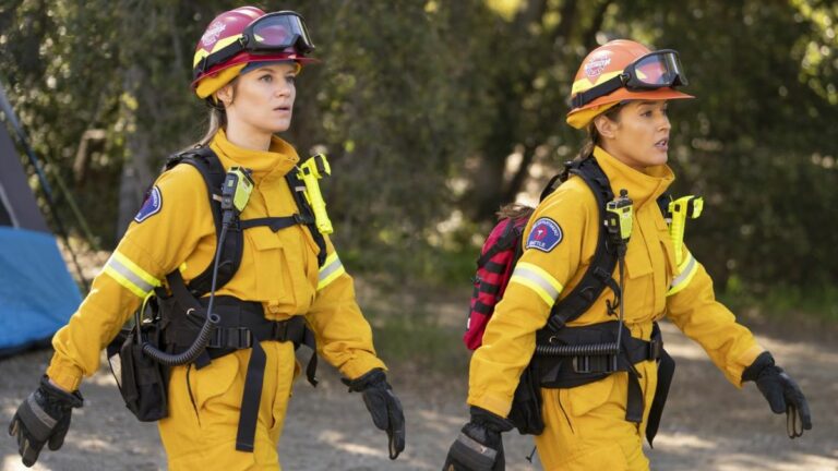 Maya Bishop (Danielle Savre) and Andy Herrera (Jaina Lee Ortiz) walk in the forest during the Station 19 episode 