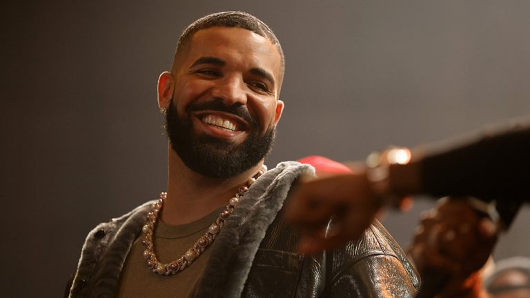 LONG BEACH, CALIFORNIA - OCTOBER 30: Drake speaks onstage during Drake's Till Death Do Us Part rap battle on October 30, 2021 in Long Beach, California. (Photo by Amy Sussman/Getty Images)