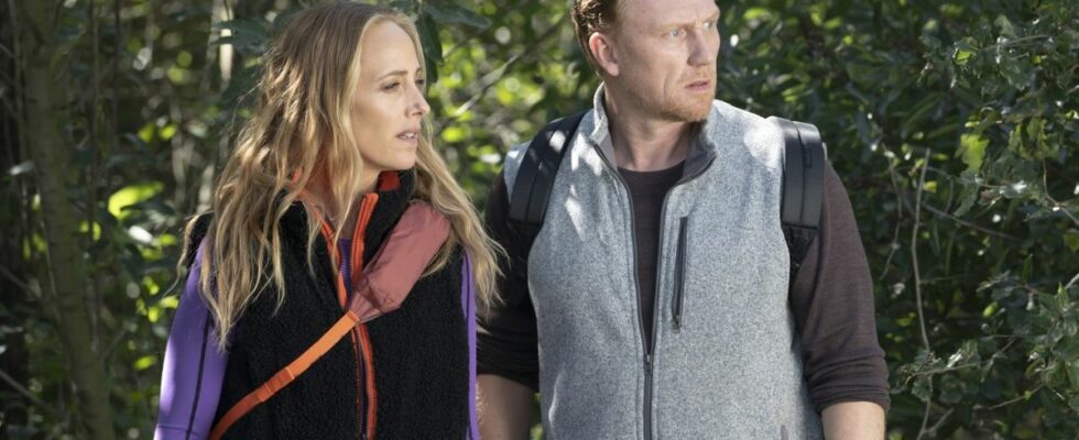Teddy Altman (Kim Raver) and Owen Hunt (Kevin McKidd) look toward some injured people while taking a hike on the Season 20 episode of Grey