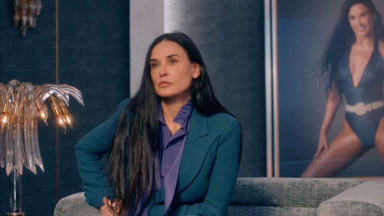 Demi Moore looking stoic starring in the body horror flick 