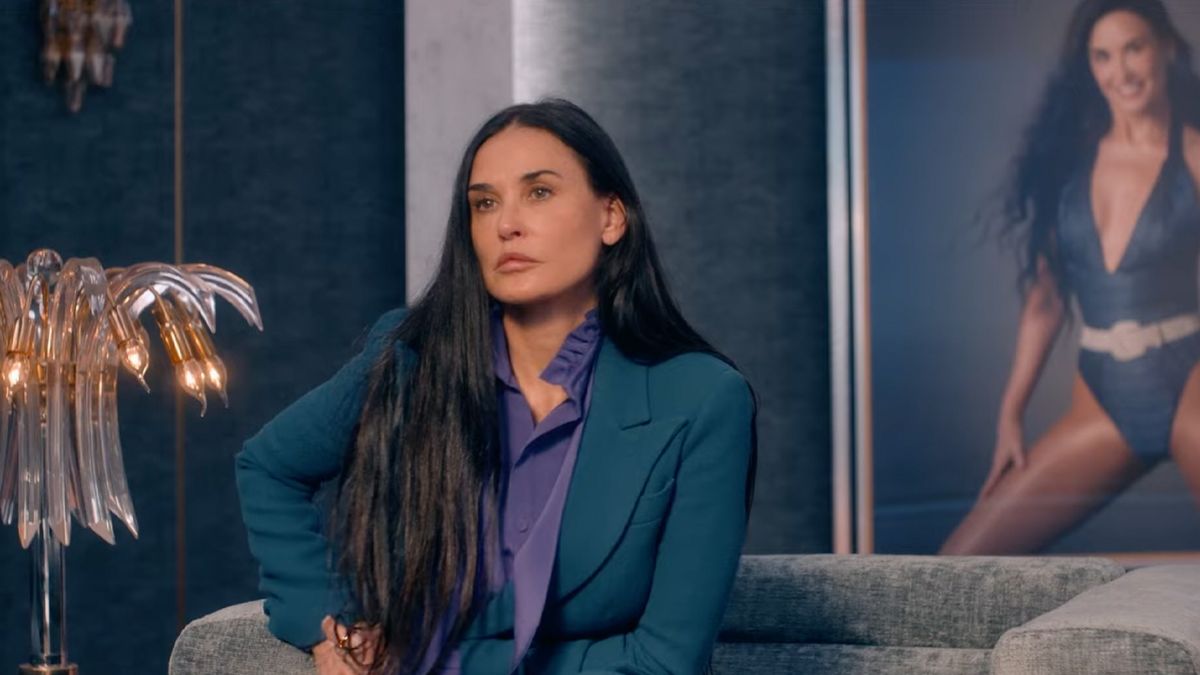 Demi Moore looking stoic starring in the body horror flick 