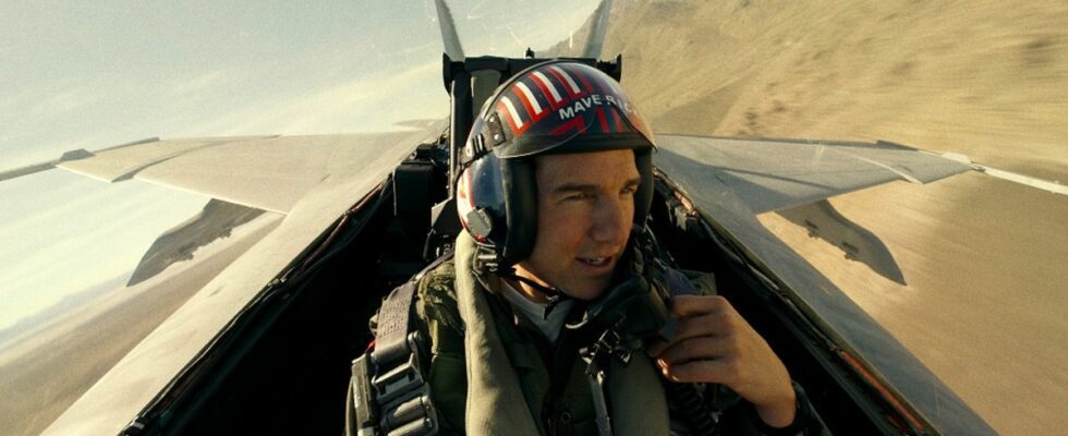 Tom Cruise talking into the radio in an airplane during Top Gun: Maverick.