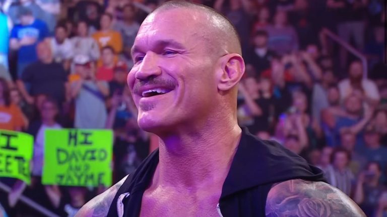 Randy Orton smiling at Cody Rhodes